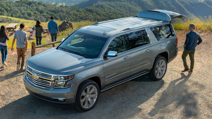 An exterior shot of a vehicle unloading people