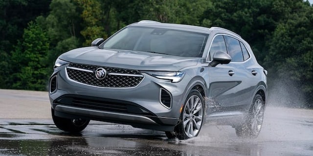 2022 Buick Envision driving along the shore