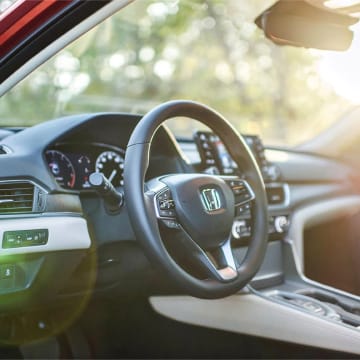 An interior shot of a the steering wheel of the Honda Accord