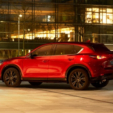 Red 2022 Mazda CX-5 in the city at night